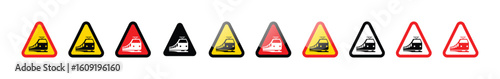 A row of nine triangular warning signs indicating the presence of a tramway
