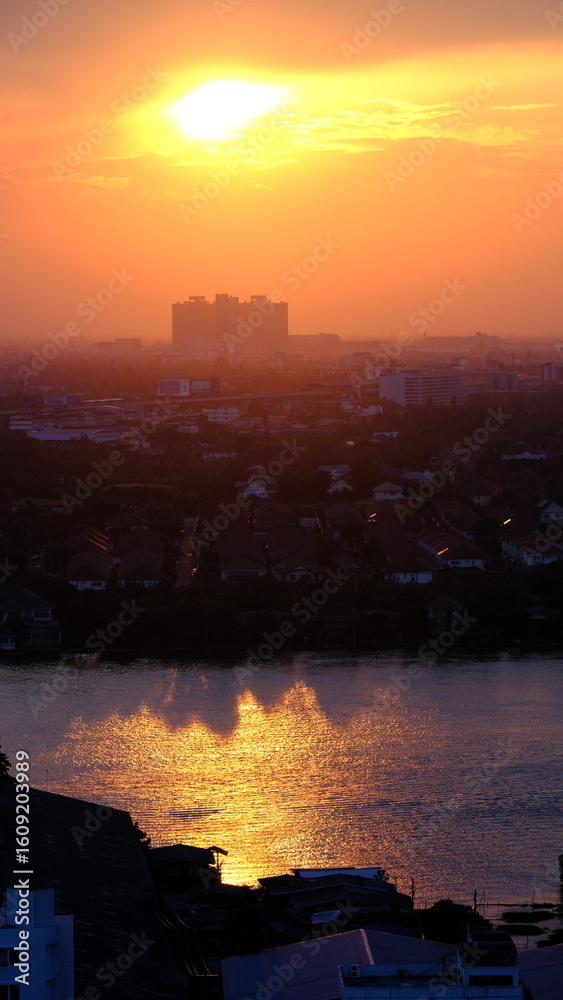 Fototapeta premium Aerial view of chao phraya river with landmark of Thailand, Sunset Atmosphere Along
