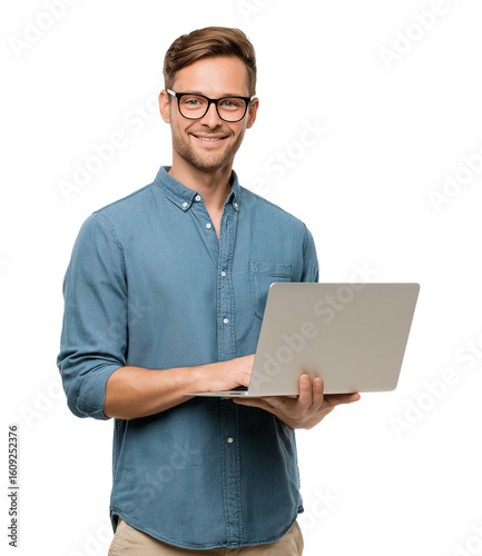 A smiling man in his thirties, wearing glasses and a blue shirt, is holding an open laptop computer on a transparent background
