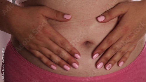 Wallpaper Mural female hands heart shape belly closeup pink underwear bare skin manicure concept of women health body positivity self love Torontodigital.ca