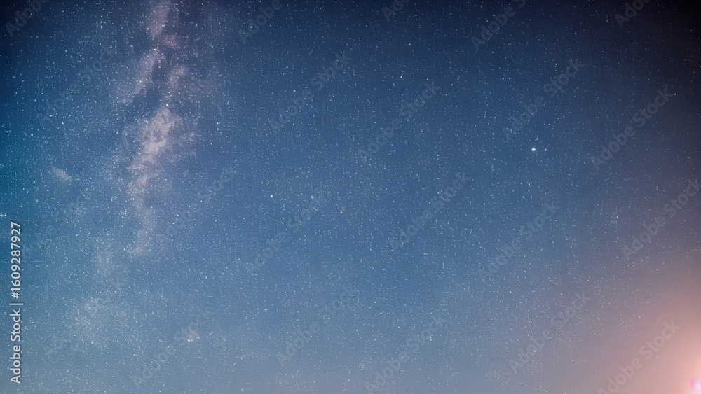 Obraz premium Bright water drops on a black wall with blue clouds and abstract texture