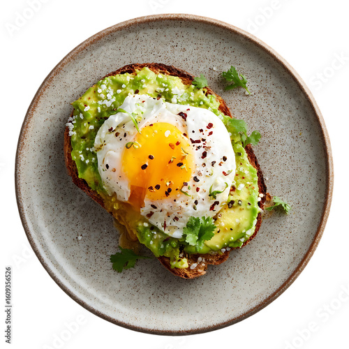 Delicious avocado toast topped with a perfectly poached egg and seasonings