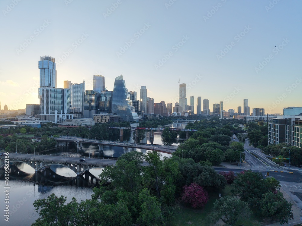 Fototapeta premium Beautiful Austin skyline downtown at sunrise with a stunning aerial drone view