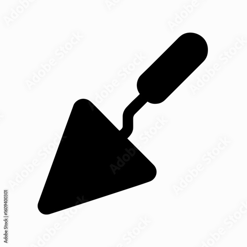Trowel icon in solid style representing masonry and plastering tool