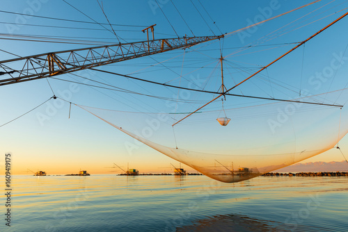 fisherman's net at the mouth of the Arno river in Marina di Pisa
