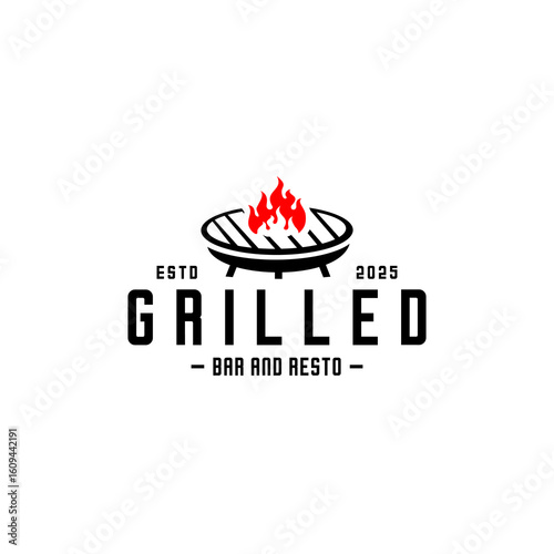 a grill and a burning fire