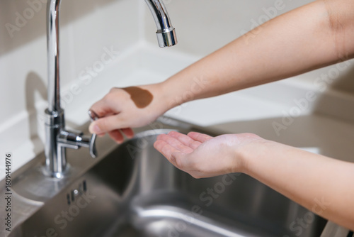 Photos Drought, No Tap water, Lack of household water concept, people open kitchen dry