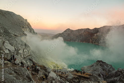 Sunrise image of Kawah Ijen, a beautiful turquoise crater lake in the stratovolcano Mount Ijen, located in East Java, a province on Indonesia's Java island