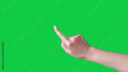 Touching Gesture. Female hand touching, tapping on chroma key green screen background. Using a smartphone, tablet pc or a touchscreen. Interface concept. triple click and tap with finger