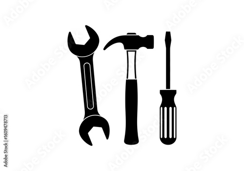 A set of three essential tools a wrench, hammer, and screwdriver for various tasks