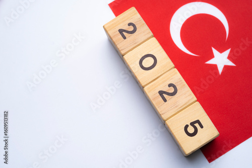 Fototapeta Naklejka Na Ścianę i Meble -  2025, Türkiyea flag with date block, Concept, Important events for Türkiye the new year, election, economy, social activities, central bank, Türkiye foreign policy