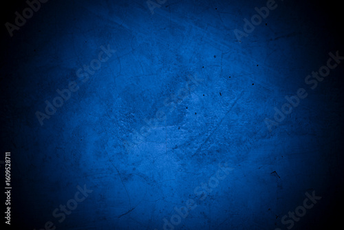 Old wall pattern texture cement blue dark abstract  blue color design are light with black gradient background.