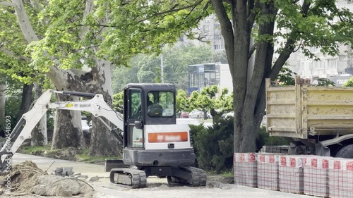 Mini Excavator Loading Truck Urban Construction