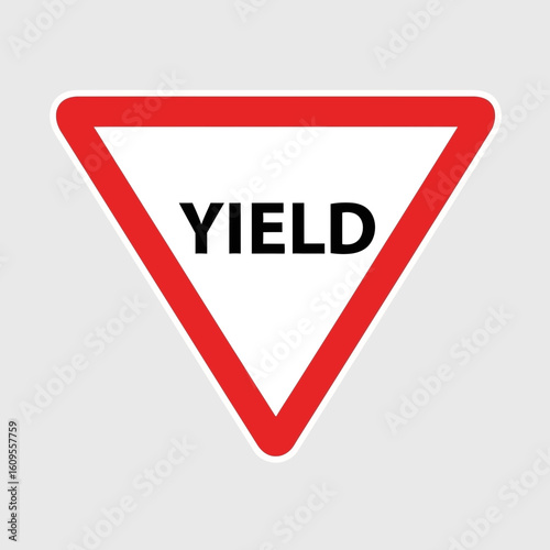 A yield road sign with a red border and white background.