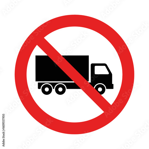 A road sign showing a truck inside a red circle with a line.