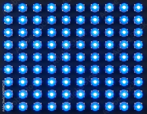 Blue LED lights on a dark panel