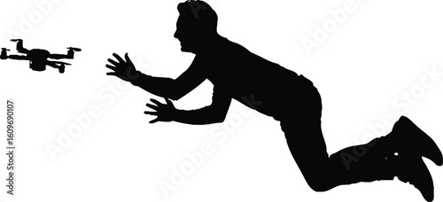 Man reaching for drone black silhouette flying