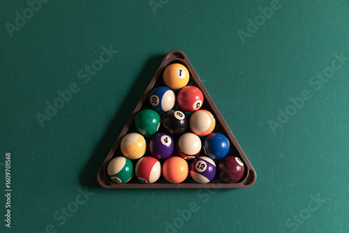 Top-down view of billiard balls in triangle rack at break position