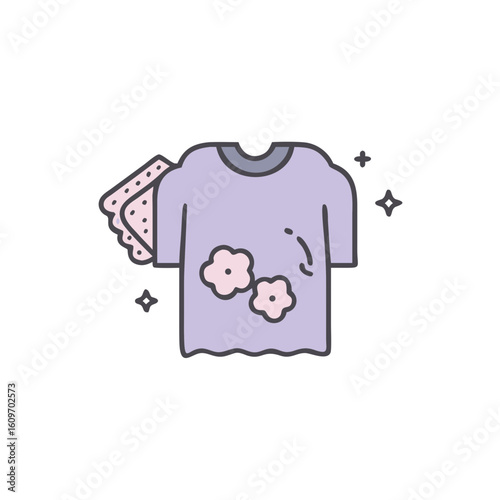 Cute purple t-shirt with floral pattern and laundry items nearby  