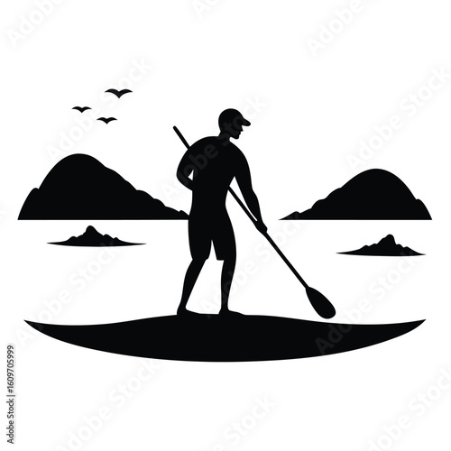Silhouette of a man paddleboarding on a lake near mountains under a sky with birds
