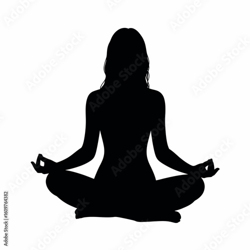 Silhouette of a Woman in Lotus Position Practicing Yoga for Wellness and Meditation with Long Hair and Relaxed Posture