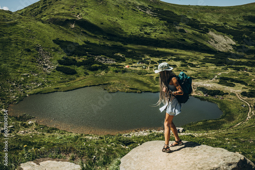 woman on a mountain lake
