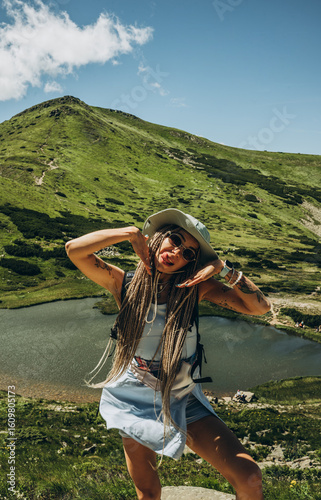 woman on a mountain lake