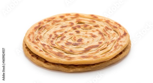 A single round layered paratha, a traditional South Asian flatbread, isolated on a white background.