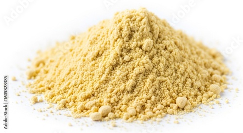 Pile of pale yellow ground spice, isolated on white background.