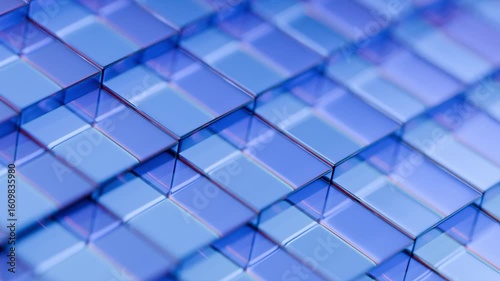 Abstract 3D motion graphic loop featuring translucent blue glass prisms or blocks arranged in an intricate geometric pattern, with subtle light refractions, ideal for technology and data themes.