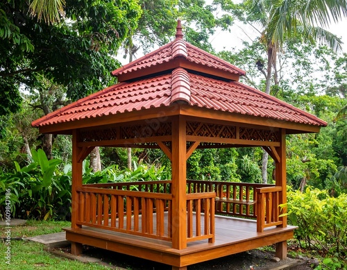 Wooden gazebo with terracotta roof in lush garden
