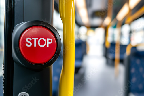 Wallpaper Mural Red stop button on public transportation. Yellow pole and blue seats are in the blurred background inside the bus. Close up shot of the button. Torontodigital.ca