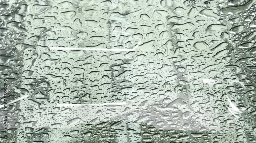 Raindrops On Glass Surface Abstract Green Background Raindrops On Glass Surface Abstract Green Background