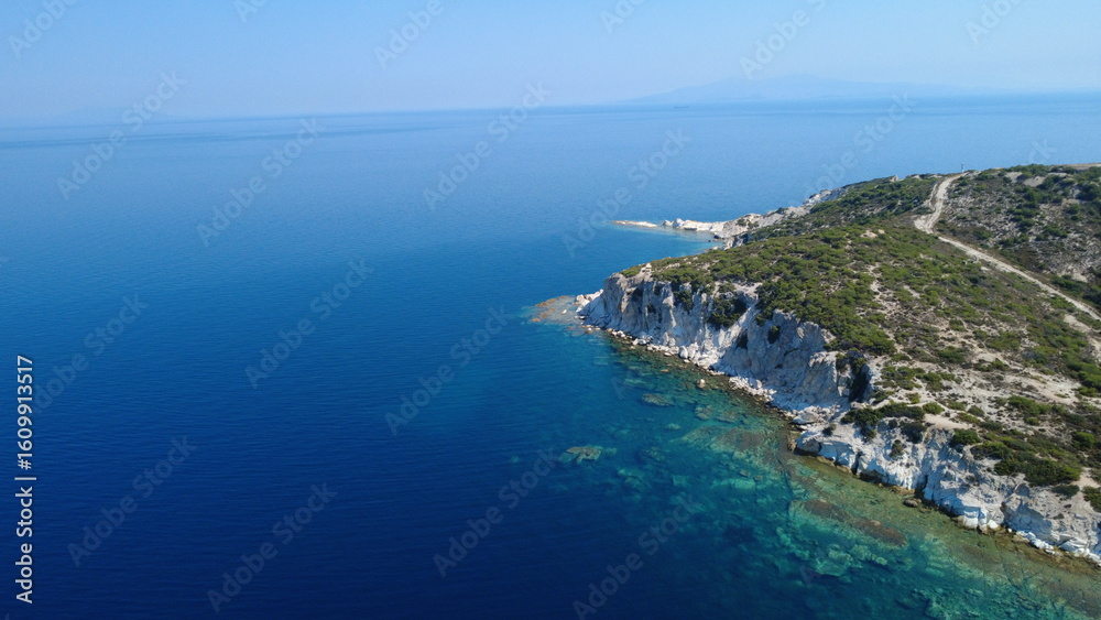 Fototapeta premium Majestic Aerial Views of Serene Sea and Rugged Coastline