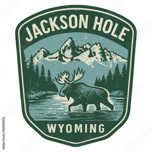 A vintage design showcasing a moose in a river with the mountains in the background, Jackson Hole Wyoming. USA city vector badge – flat style design emblem label sticker, transparent background