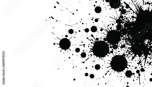 Abstract black paint splatters on a white background. Ideal for artistic projects, backgrounds, textures, prints, or creative design applications.