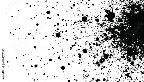 Abstract black ink splatter pattern on white for artistic backgrounds, textile prints, graphic design projects, and packaging design concepts.