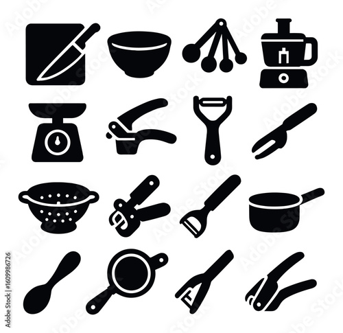 Silhouette icons of kitchen utensils and appliances on gray background