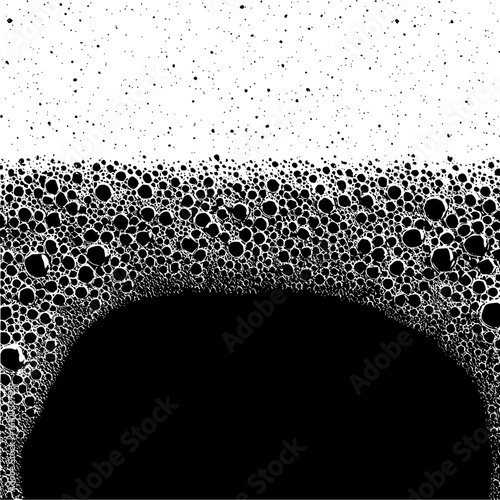 A monochrome image displaying a dense collection of bubbles over a dark expanse with scattered dots above