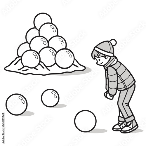 Boy with snowballs and pile of snow winter playing