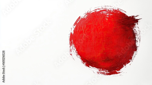 Abstract red circle with a grunge brush effect on a white background