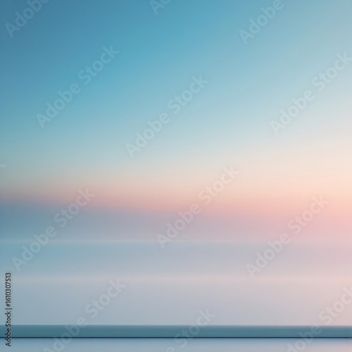 Soft pastel gradient sky over calm water at dusk