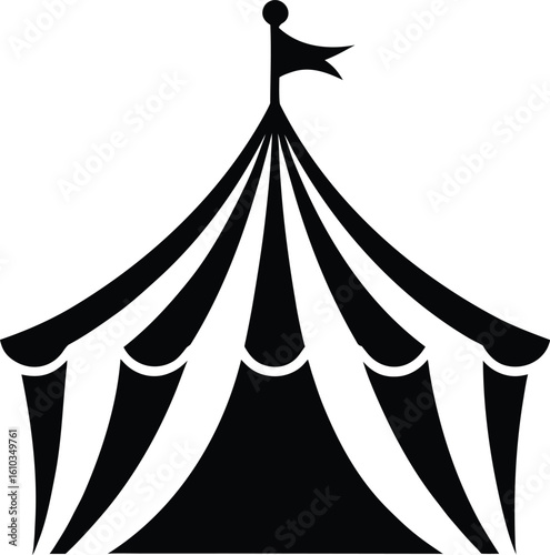 A large circus tent with a bright flag 