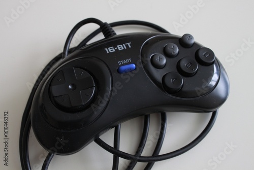 Sega Megadrive 16 bit gamepad on white background