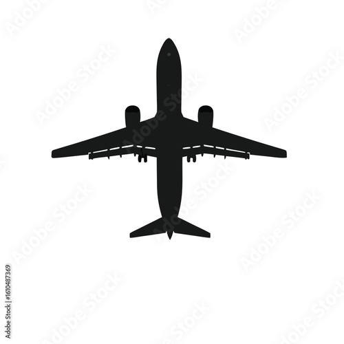 Black silhouette of a jet airplane with landing gear extended aircraft aviation