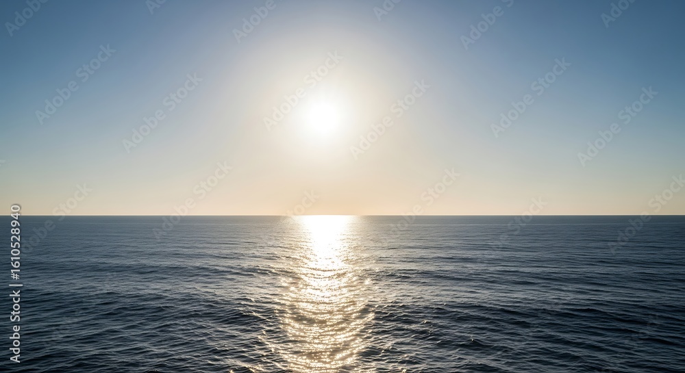 Obraz premium Serene Ocean Horizon Bathed in Golden Sunlight Creating a Tranquil Seascape