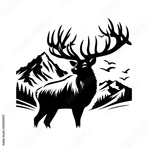 Majestic elk with large antlers stands before mountains