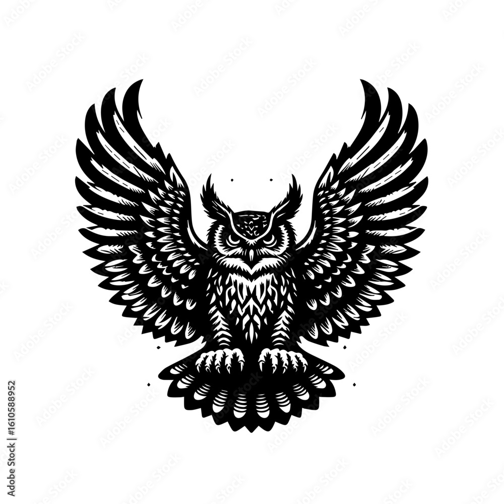 Obraz premium An owl with its wings spread wide in flight