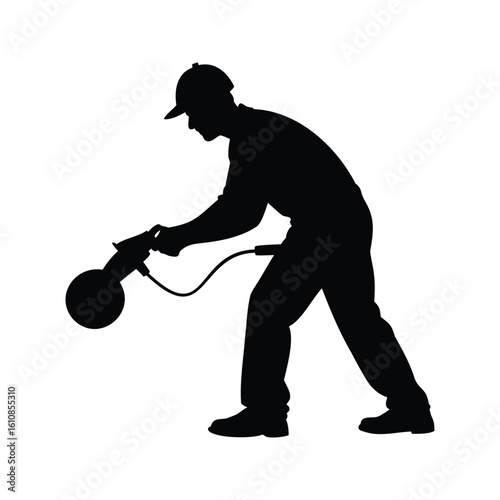 Silhouette of a worker using a floor buffing machine for polishing