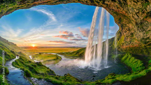 Beautiful sunset sunlight shining on waterfall